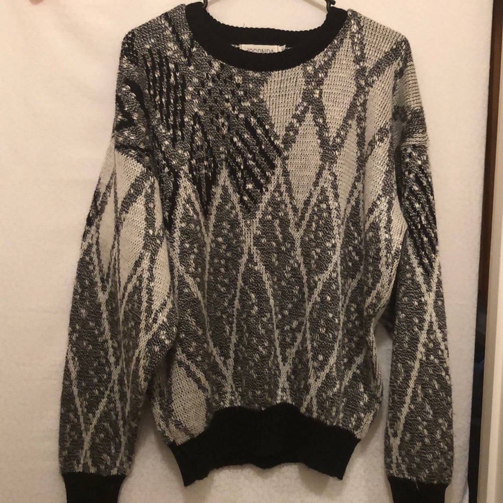 Large black and gray men’s sweater